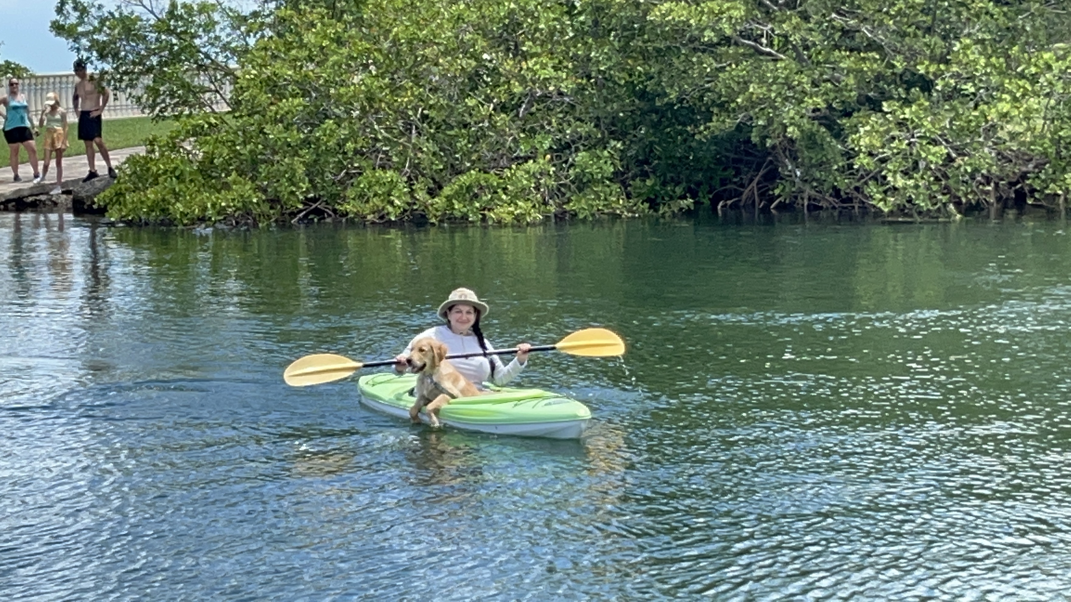 Blaire and her dog kayaking